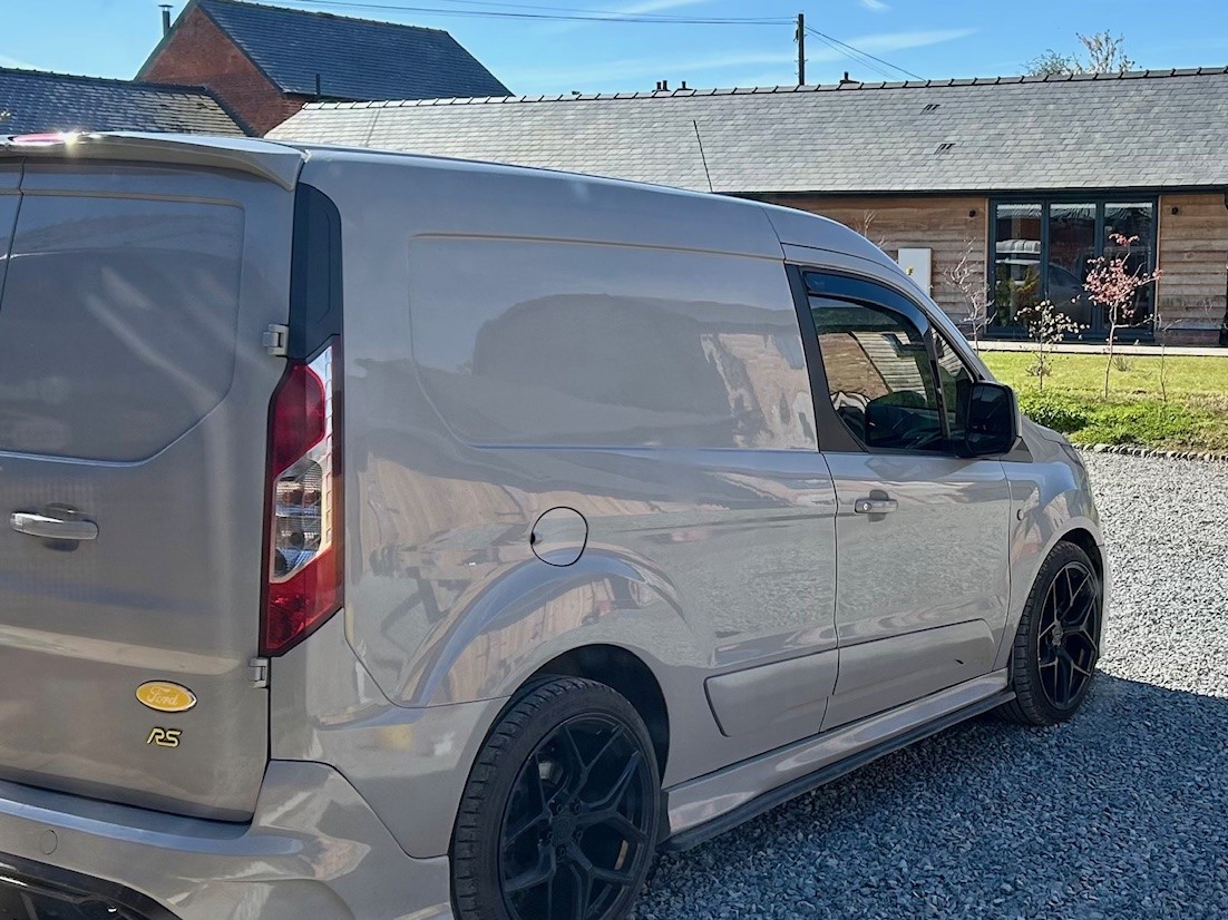 Roll With It van parked outside a freshly painted Herefordshire cottage
